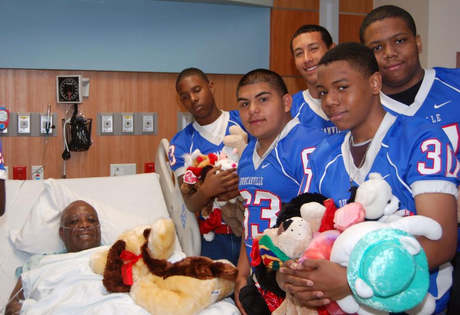 Football team stuffed animal charity event