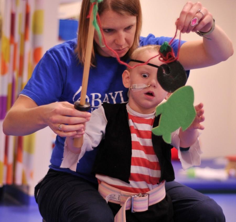 Tristan Russell undergoes Morning Thereapy at Baylor's Our Children's House