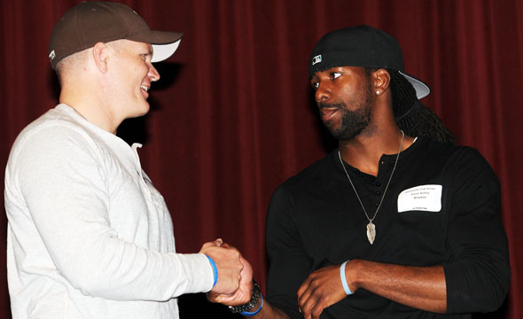 Photos: Dallas Cowboys, inspirational rapper visit with sophomores