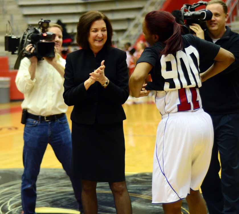 Coach Cathy Self-Morgan celebrates win number 900 during 2013 season. (Tricia Virtue photo)