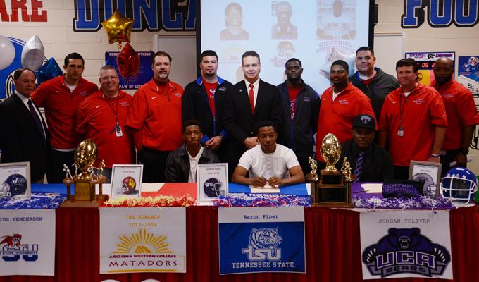 Six studendts signed their letter of intent to play college football today. Pictured are Tre Edwards, Arizona Western, Aaron Piper, Tennessee State University and Jordan Toliver, University of Central Arkansas. (Ariana Canchola photo)