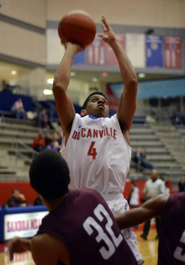 Junior DJ Wallace goes up for the basket against Mansfield Timberview. (Abigail Padgett photo)