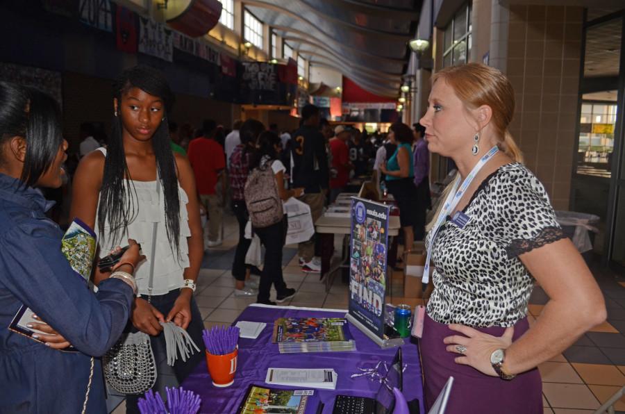 Students talk to college representatives at a previous college night. (Photo by Brandon Rogers)