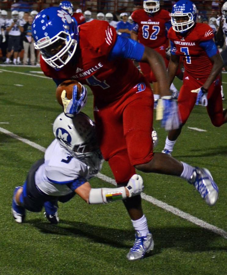 Photos: Varsity football team pulls off close win against Midlothian