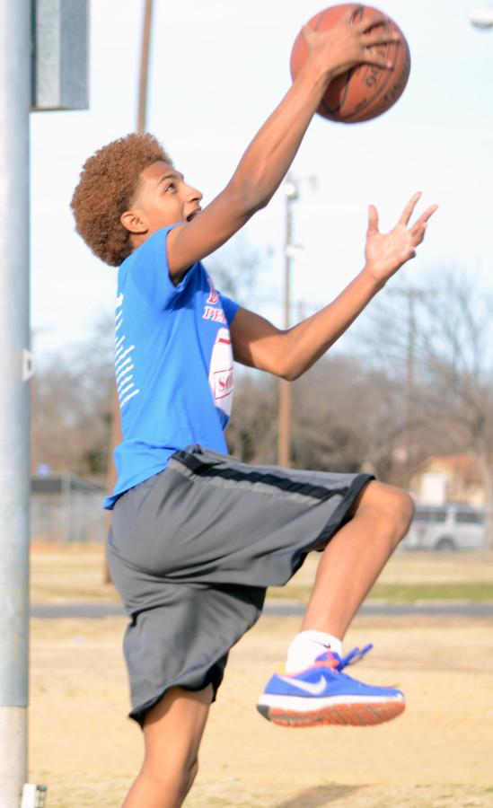 A student from playing at the community awareness event at Lakeside (Leenolia Robinson photo)