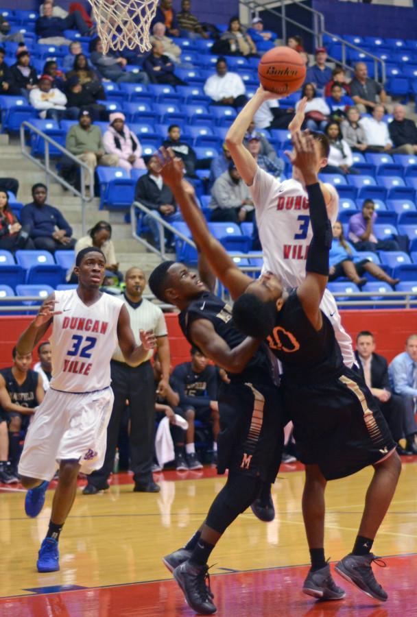 Photos: Varsity Boys Basketball vs. Mansfield 