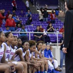 Pantherette head coach Cathy Self-Morgan shares a winning moment with her seniors on the bench at the end of their 70-29 blowout over LD Bell in the Region 1 Finals game. (Olivia Davila photo)