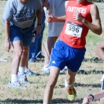 During any given meet, Coach Beale Tolbert could be found on the sideline near the finish encouraging her runners to stay in the race.  Tolbert will retire from coaching this year leaving her mark on high school athletics after 30 years. (Tricia Virtue photo)