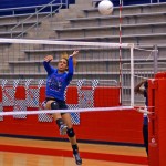 Sophomore Mahlia Miller sends the ball back at the opponent Grand Prairie in the first round of district play. (Jordan Bell photo)