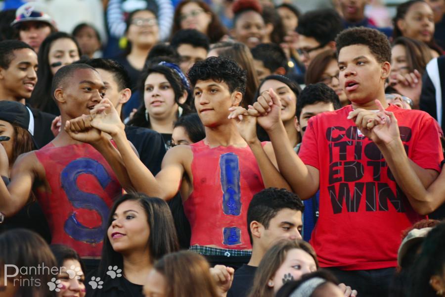 Some students take their spirit to a completely different level with body and face paint, props, and signs. (Karla Estrada photo)