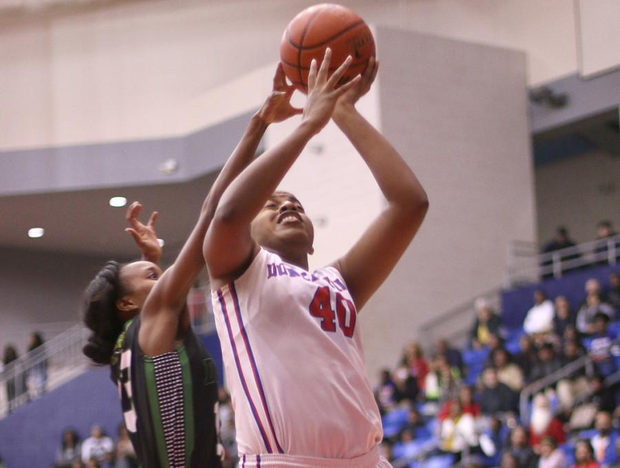 Senior Pantherette Post Cierra Johnson goes to the basket against DeSoto in a district matchup. (Cynthia Rangel Photo)