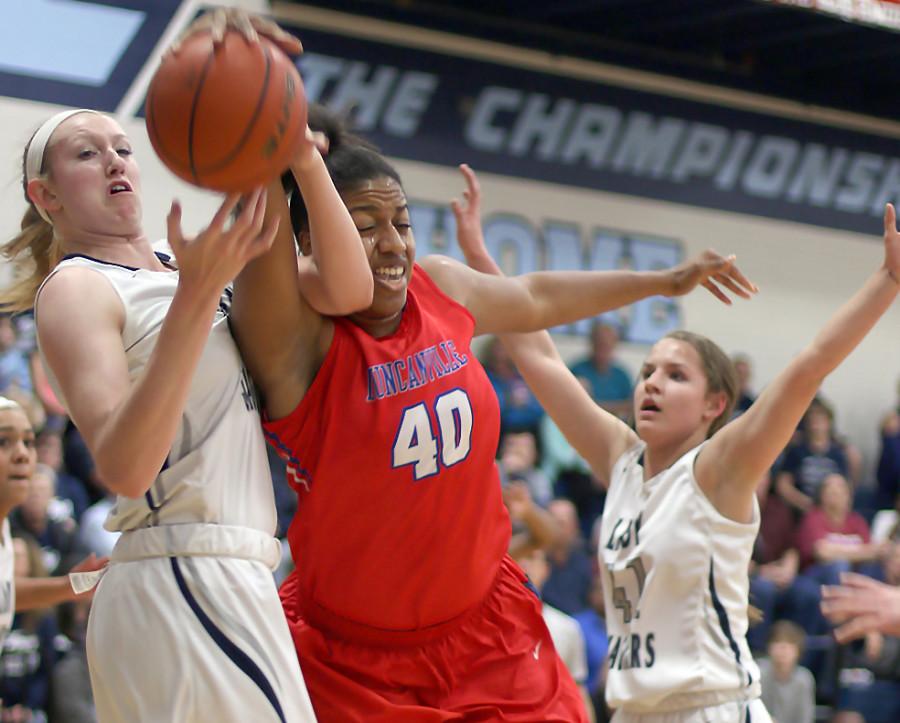 Senior Cierra Johnson fights for the rebound against Flower Mound's Lauren Cox. (Kyhia Jackson photo)