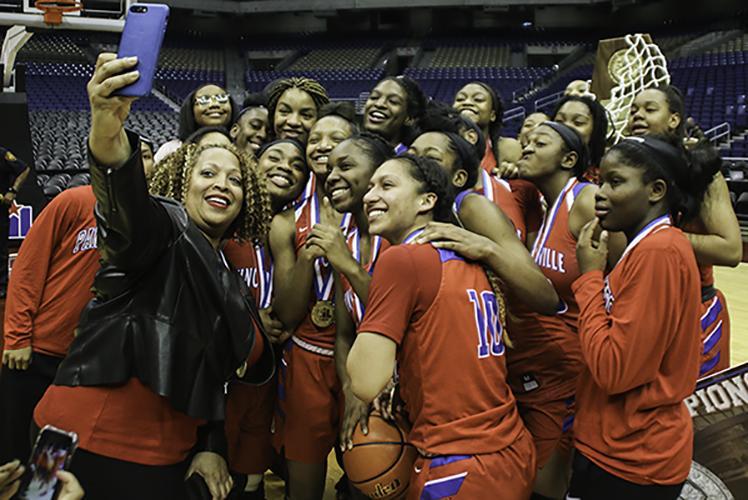 DHS principal Tia Simmons snaps a selfie with the team after the Pantherettes win the 6A State Championship. (Jose Sanchez photo)