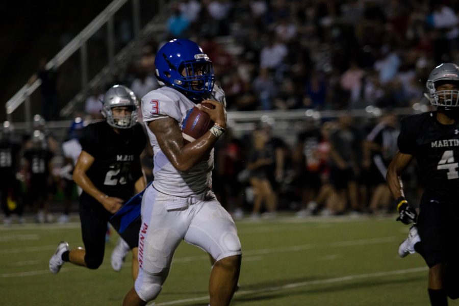 Ja'quinden Jackson breaks though and scores a touchdown against Arlington Martin