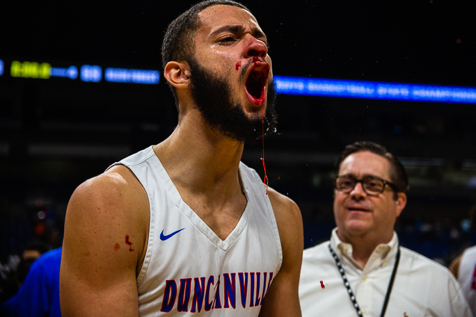 Junior Preiss Banks celebrates after Duncanville captured the UIL state basketball championship in San Antonio.