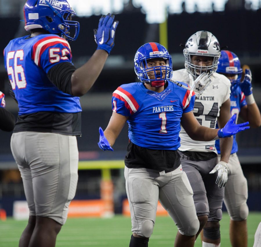 Trysten Smith celebrating after scoring Against Arlington Martin 