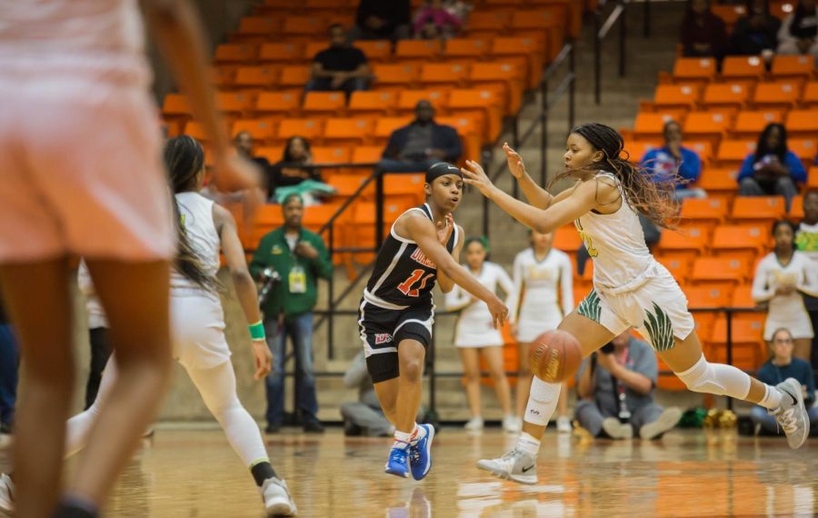 Tristen Taylor Passes the ball up the court against Desoto.