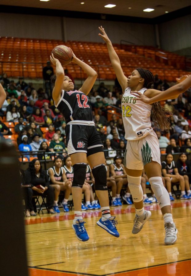 Zaria Rufus takes a shot against Desoto.