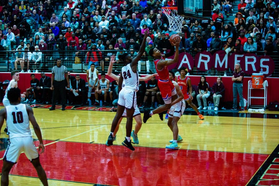 Zhuric Phelps goes up against Lewisville.