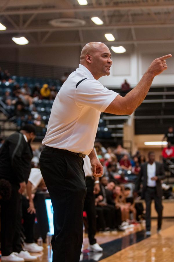 Coach Peavy communicating with players in-game against South Grand Prairie.