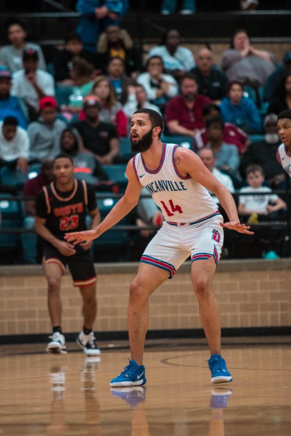 Sr Forward Robert Banks in-game against South Grand Prairie.