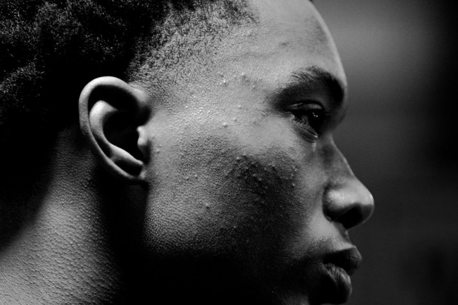 Ron Holland focused during halftime in the locker room.