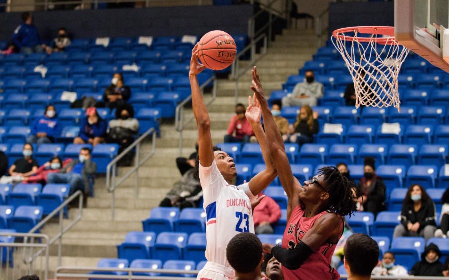 Cameron Barnes (23) goes up for the dunk against Waco high school.