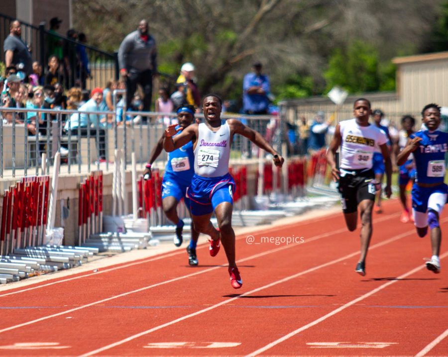 Senior Roderick Daniels limps across the finish line at the Region 2 finals in Waco. 