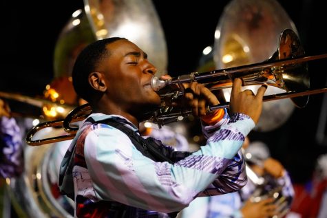 Dylan Sims plays during the performance of New York.