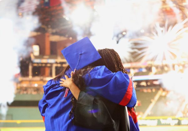 Students celebrate at graduation.