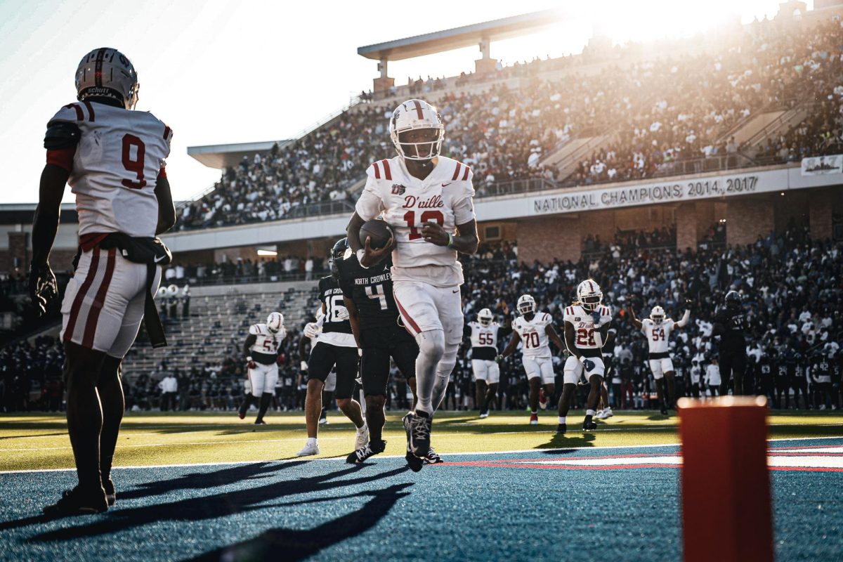 Keelon Russell (12) crosses the goal line to put the panthers ahead in the UIL state semifinal game in Allen, TX.