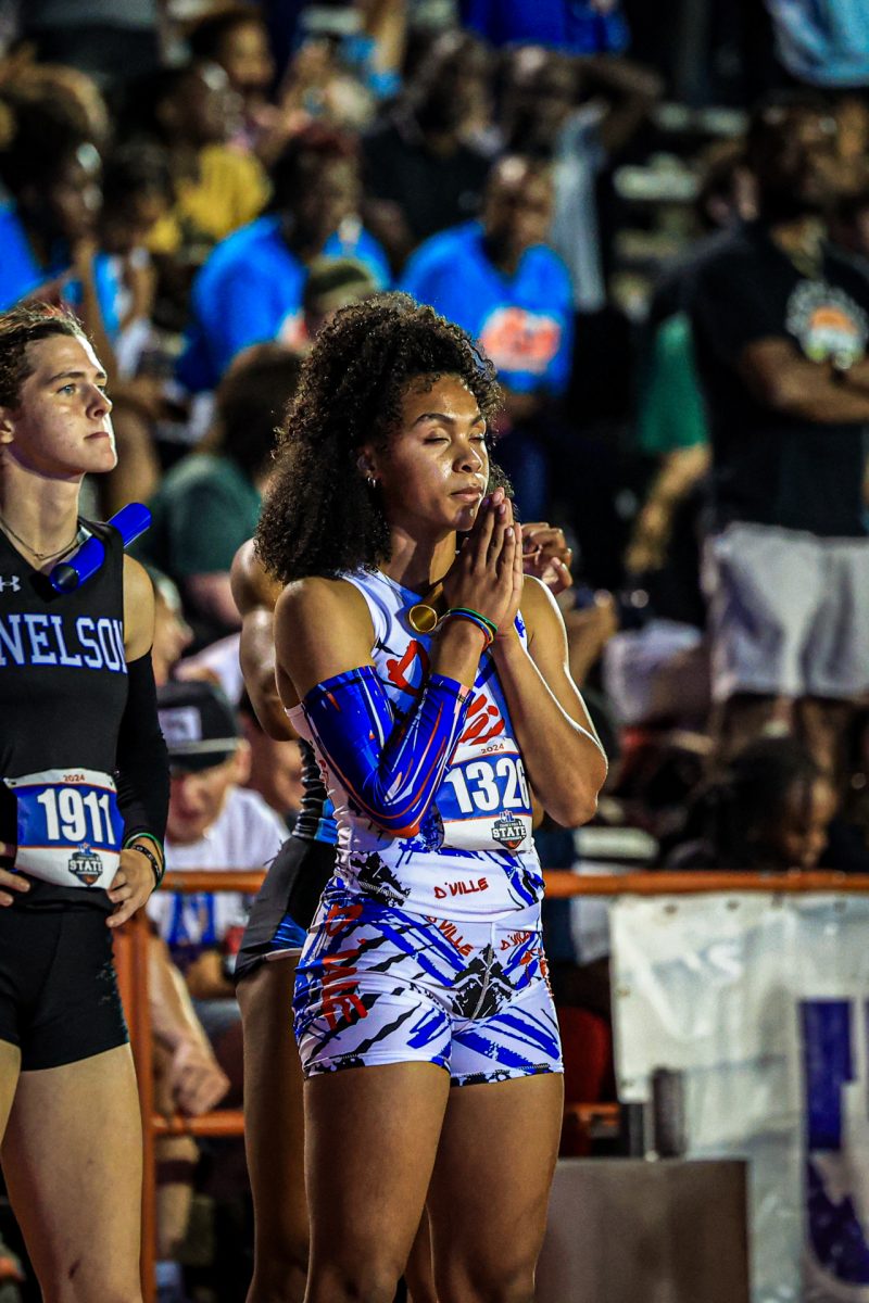 Freshman Pilar Garcia focuses before running the first leg of the 4X400 relay at the UIL state meet. 