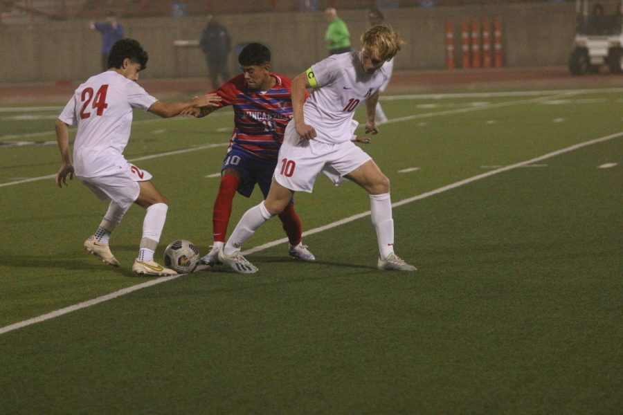 Here we have Edson Marchan, #10 trying to get through two Allen players, from last Friday's first scrimmage.